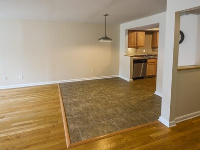The  greatroom and informal dining spot combine to