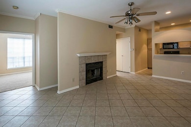 Living area has fireplace and remote control ceili