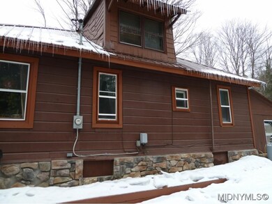 Side view with dormer/attic