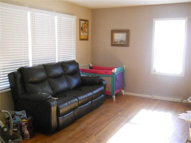 Bright and cheery living room with ample natural l