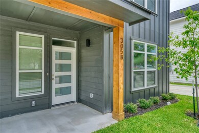 Entrance to property featuring board and batten si