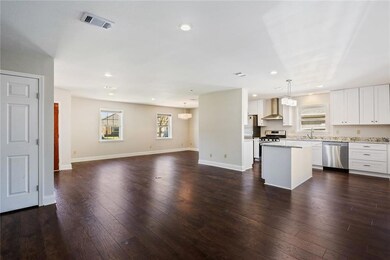 Open concept living, dining and kitchen