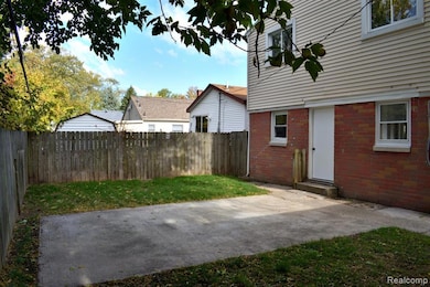 Fenced backyard featuring a patio area