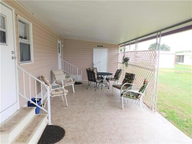 Carport is also used for outside entertaining area.