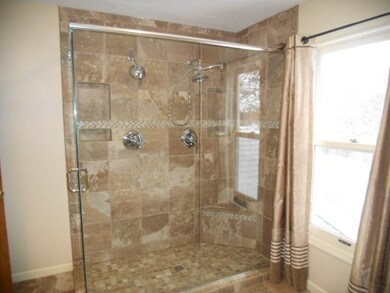 Plenty of Room for two in this custom tile walk in