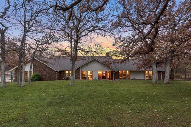 View of front facade with a lawn