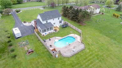 Fenced pool area with plenty of room for entertain