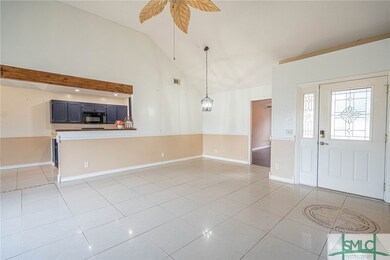 OPEN CONCEPT GREAT ROOM WITH GAS FIREPLACE AND CAT