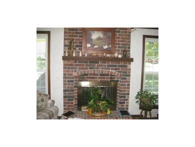 Brick fireplace in Family Room.