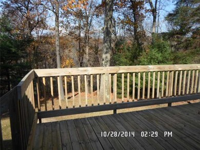 Exterior Back. deck and view of private rear yard.