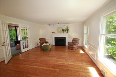 Formal Living Room with gas fireplace and french d