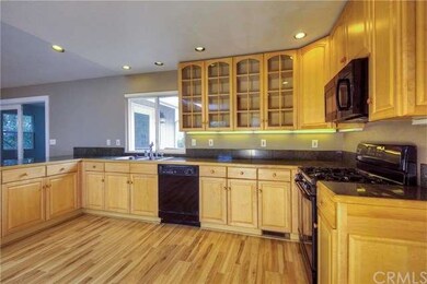Cabinets have pull-out shelves on the bottom and d