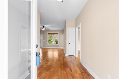 Hall featuring light wood-type flooring