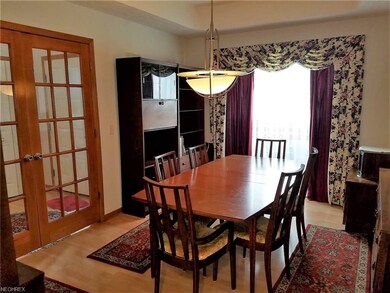 Formal Dining Room with French doors into foyer...