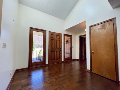 Ope foyer with coat closet. 