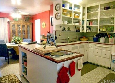 Original yet charming kitchen overlooking the form