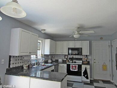 Kitchen - Eat In. Ceramic Tile Floor And Back Spla