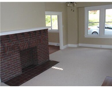 Living Room. Large living room with brick fireplac