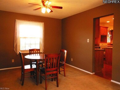 Formal Dining Room with View of the Back Yard & Pa