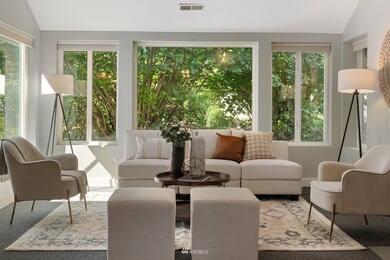 Sun streams in from the western (left) windows for gorgeous evening light, but the whole home stays cool thanks to AC!