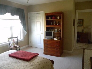Guest bedroom with closet and plenty...