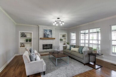 Spacious Family room with gorgeous stone fireplace