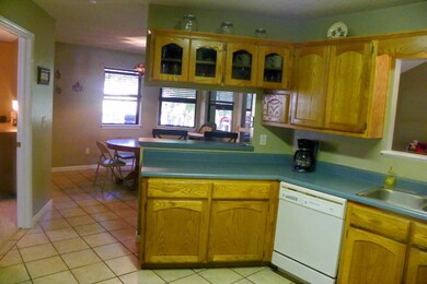 Kitchen: View from Kitchen into Dining Area. Oak C