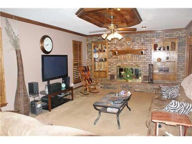 Living Room. Beautiful stained woodwork on the cro