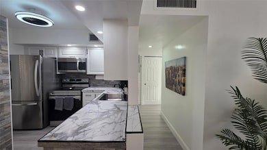 2831 Somerset Dr unit 105, Lauderdale Lakes, FL 33311 - photo 7