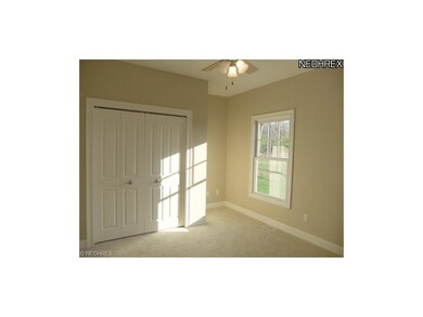 The guest bedroom offers a light and bright layout
