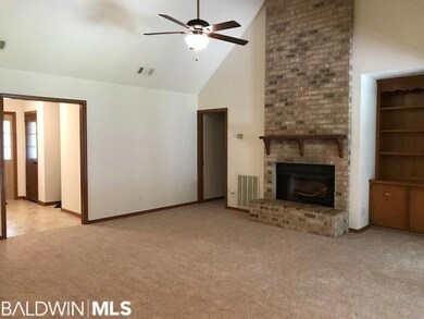 Vaulted ceiling and wood burning fireplace