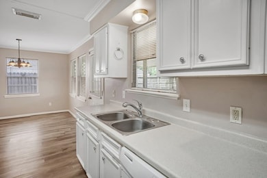 Watch your kiddos play while you tidy up the kitch