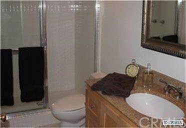 Full bath downstairs next to  guest bedroom.