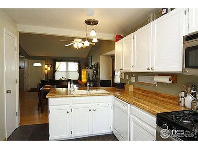 View of dining and living area from kitchen