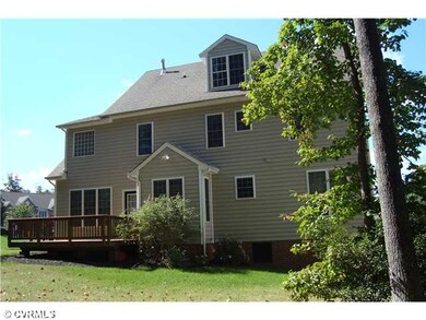Exterior Back - Vinyl siding on three sides provid