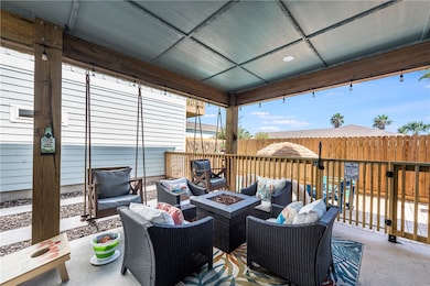 Covered patio for enjoying the coastal breezes.