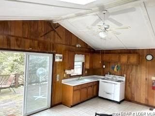 Open kitchen, dining, living area. Vaulted ceiling