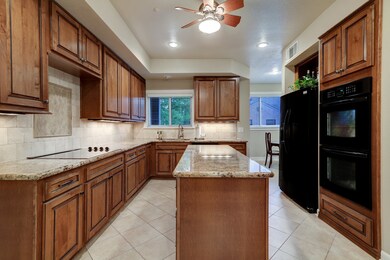 Wow! Stunning remodeled Island Kitchen with separate Breakfast Room! Boasting 16