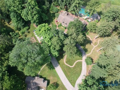 Aerial showing home and guest house.