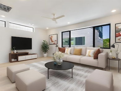 Living area featuring ceiling fan, recessed light