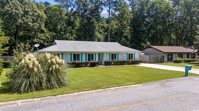 Single story home featuring a front yard