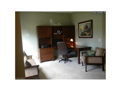 Den or dining room in front of home.