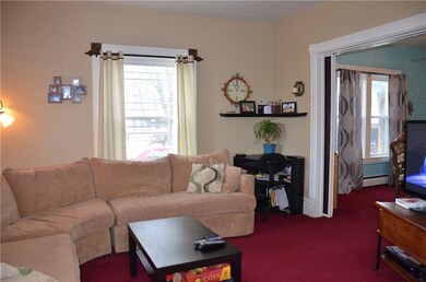 Notice the original wood pocket doors with thinck 