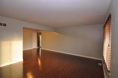 Open living room, dining room area.