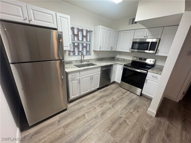 Kitchen with stainless steel appliances.
