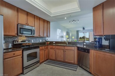 Abbey kitchen with view of lake and golf course