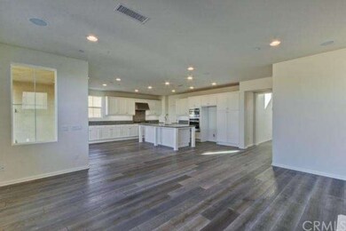 Spacious great room for all your entertaining needs, as shown in the actual home