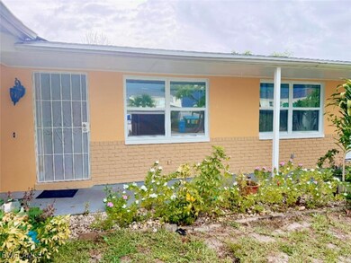 View of property exterior featuring brick siding a