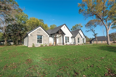 212 Clayton Crossing, Springtown, TX 76082 - photo 2