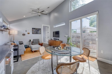Dining room featuring finished concrete flooring,